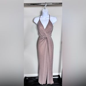 A form fitting dress for sure. It will make you feel like a star!